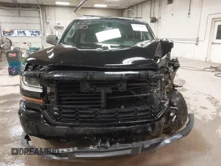 2017 Chevrolet Silverado 1500 Custom with VIN 1GCVKPEC2HZ331214, listed as a IAAI auction lot 40228283 with 132,407 mi miles. Bid and sale history available at carsss.com. Image 12.