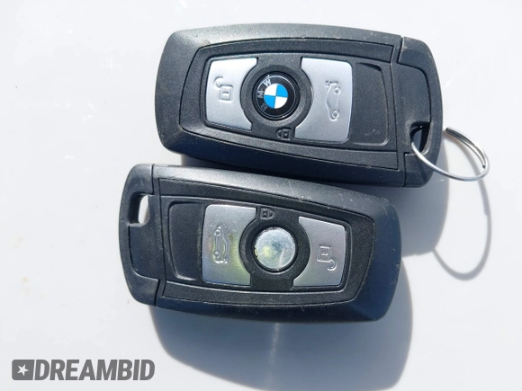 2014 BMW 3 Series 328d xDrive with VIN WBA3D5C53EKX95091, listed as a IAAI auction lot 41696613 with 117,982 mi miles. Bid and sale history available at carsss.com. Image 11.