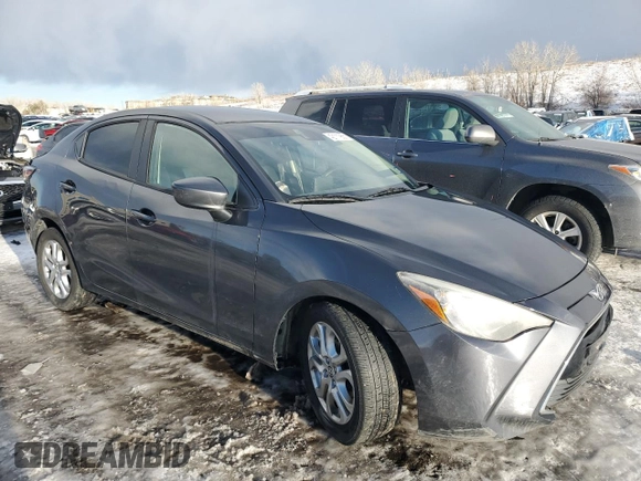 2016 Scion iA with VIN 3MYDLBZV1GY103531, listed as a Copart auction lot 42111955 with 104,882 mi miles and Salvage Title. Bid and sale history available at carsss.com. Image 4.
