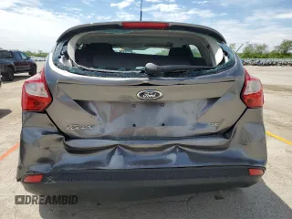 2014 Ford Focus SE z VIN 1FADP3K21EL424134, wystawiony jako Copart lot #56692545 z przebiegiem 46 342 mil mil oraz Szkoda całkowita • Salvage title. Historia ofert i sprzedaży dostępna na DreamBid. Obrazek 6.