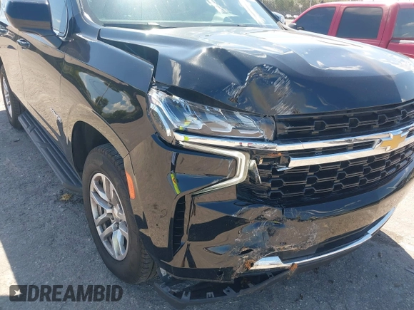 2023 Chevrolet Tahoe LS z VIN 1GNSCMKD9PR282840, wystawiony jako IAAI lot #41904280 z przebiegiem 73 298 mil mil oraz . Historia ofert i sprzedaży dostępna na DreamBid. Obrazek 6.