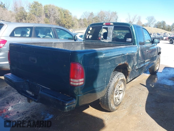 2000 Dodge Dakota with VIN 1B7GL22X1YS600067, listed as a IAAI auction lot 41671267 with 201,664 mi miles. Bid and sale history available at carsss.com. Image 4.