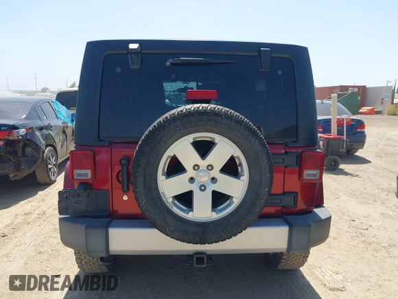 2012 Jeep Wrangler Unlimited Sahara with VIN 1C4BJWEG2CL209600, listed as a IAAI auction lot 42015290 with 133,229 mi miles and . Bid and sale history available at DreamBid. Image 16.
