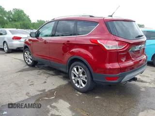 2016 Ford Escape Titanium with VIN 1FMCU9JX0GUA29353, listed as a IAAI auction lot 42133326 with 143,892 mi miles and . Bid and sale history available at DreamBid. Image 3.