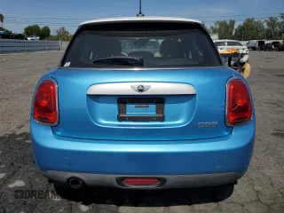 2015 MINI Hardtop 4 Door z VIN WMWXS5C5XFT827473, wystawiony jako Copart lot #58261135 z przebiegiem 75 439 mil mil oraz Szkoda całkowita • Salvage title. Historia ofert i sprzedaży dostępna na DreamBid. Obrazek 6.