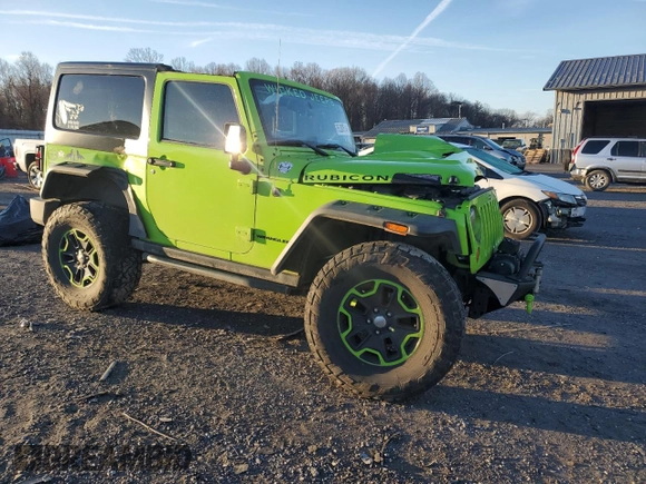 2013 Jeep Wrangler Rubicon 10th Anniversary with VIN 1C4BJWCG0DL506174, listed as a Copart auction lot 85300514 with 133,974 mi miles and Salvage Title. Bid and sale history available at DreamBid. Image 4.