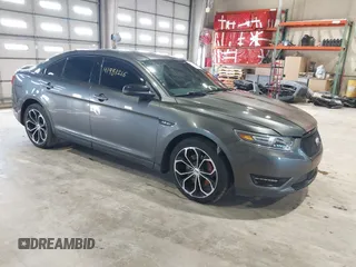 2015 Ford Taurus SHO z VIN 1FAHP2KT4FG122979, wystawiony jako IAAI lot #41981216 z przebiegiem 150 125 mil mil oraz . Historia ofert i sprzedaży dostępna na DreamBid. Obrazek 1.