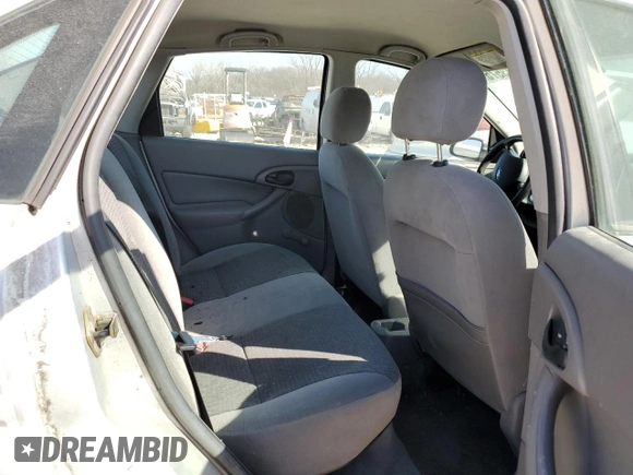 2003 Ford Focus LX с VIN 1FAFP33P63W187283, выставлен на аукционе Copart как лот 48803575 с пробегом Не указан миль и Списание • Salvage title. История ставок и продаж доступна на DreamBid. Изображение 11.
