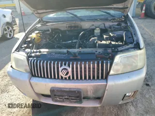 2007 Mercury Mariner Convenience z VIN 4M2YU80Z47KJ11826, wystawiony jako Copart lot #77327954 z przebiegiem 195 320 mil mil oraz Szkody całkowita. Historia ofert i sprzedaży dostępna na DreamBid. Obrazek 13.