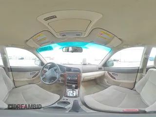 2003 Subaru Legacy Outback z VIN 4S3BH665937644454, wystawiony jako Copart lot #57404695 z przebiegiem 242 345 mil mil oraz Szkoda całkowita • Salvage title. Historia ofert i sprzedaży dostępna na DreamBid. Obrazek 14.