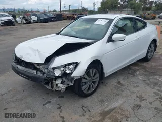 2009 Honda Accord Cpe EX-L with VIN 1HGCS12849A000477, listed as a IAAI auction lot 41783364 with 146,813 mi miles. Bid and sale history available at carsss.com. Image 2.