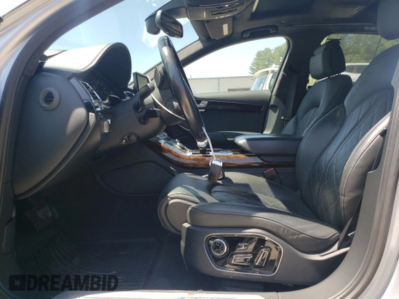 2016 Audi A8 Sport z VIN WAU43AFD7GN005425, wystawiony jako Copart lot #58781405 z przebiegiem 139 435 mil mil oraz Szkoda całkowita • Salvage title. Historia ofert i sprzedaży dostępna na DreamBid. Obrazek 7.