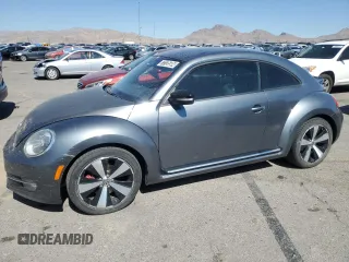2012 Volkswagen Beetle 2.0T Turbo with VIN 3VWV67AT3CM617977, listed as a Copart auction lot 73135504 with 141,511 mi miles and Clean Title. Bid and sale history available at carsss.com. Image 1.