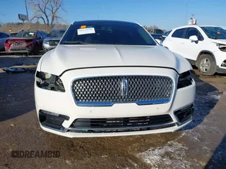 2017 Lincoln Continental Reserve with VIN 1LN6L9RP4H5609432, listed as a IAAI auction lot 41274549 with 104,742 mi miles. Bid and sale history available at carsss.com. Image 13.