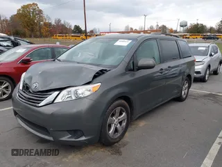 2012 Toyota Sienna LE AAS with VIN 5TDKK3DC5CS253020, listed as a IAAI auction lot 40900034 with 208,421 mi miles. Bid and sale history available at carsss.com. Image 17.