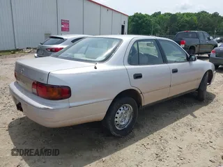 1996 Toyota Camry DX z VIN 4T1BG12K6TU752299, wystawiony jako IAAI lot #42239717 z przebiegiem 365 814 mil mil oraz . Historia ofert i sprzedaży dostępna na DreamBid. Obrazek 4.