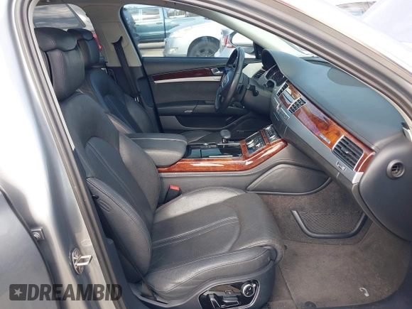 2011 Audi A8 with VIN WAUAVAFD5BN021080, listed as a IAAI auction lot 41223418 with 80,538 mi miles and . Bid and sale history available at DreamBid. Image 5.