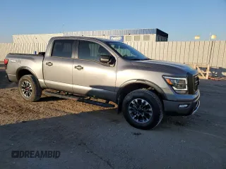 2024 Nissan Titan Pro-4X with VIN 1N6AA1ED7RN106901, listed as a Copart auction lot 43573995 with 42,973 mi miles and Salvage title. Bid and sale history available at DreamBid. Image 4.