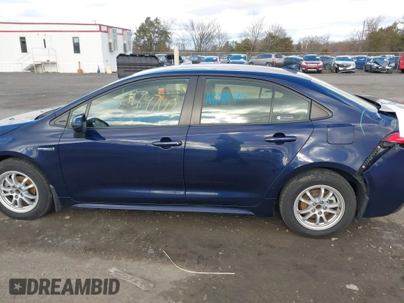 2021 Toyota Corolla Hybrid LE with VIN JTDEAMDE9MJ021431, listed as a IAAI auction lot 41747142 with 165,680 mi miles. Bid and sale history available at carsss.com. Image 14.