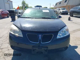 2005 Pontiac G6 GT z VIN 1G2ZH548454158374, wystawiony jako IAAI lot #42241745 z przebiegiem 154 612 mil mil oraz . Historia ofert i sprzedaży dostępna na DreamBid. Obrazek 12.