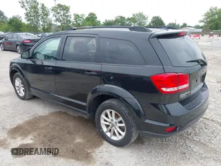 2017 Dodge Journey SXT z VIN 3C4PDCBG1HT531835, wystawiony jako IAAI lot #42867564 z przebiegiem 197 073 mil mil oraz . Historia ofert i sprzedaży dostępna na DreamBid. Obrazek 3.