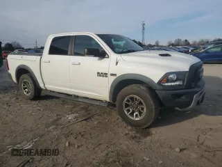 2016 Ram 1500 Rebel z VIN 1C6RR7YT3GS385998, wystawiony jako Copart lot #88633265 z przebiegiem 133 802 mil mil oraz Szkody całkowita. Historia ofert i sprzedaży dostępna na DreamBid. Obrazek 4.