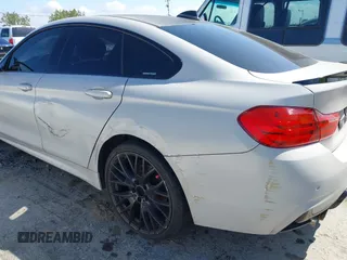 2015 BMW 4 Series 428i xDrive with VIN WBA4C9C54FD330582, listed as a IAAI auction lot 42135691 with 127,289 mi miles and . Bid and sale history available at DreamBid. Image 16.