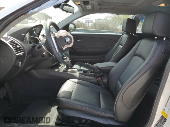 2013 BMW 1 Series 128i with VIN WBAUP7C50DVX52011, listed as a Copart auction lot 71388914 with 51,081 mi miles and Salvage Title. Bid and sale history available at carsss.com. Image 7.