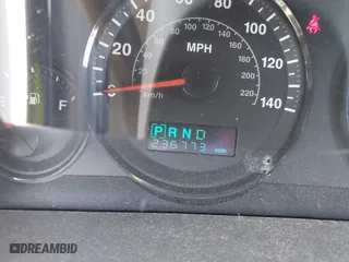 2005 Jeep Grand Cherokee Laredo with VIN 1J4HS48N95C677083, listed as a IAAI auction lot 41452025 with 236,773 mi miles. Bid and sale history available at carsss.com. Image 7.