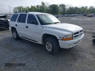 1999 Dodge Durango z VIN 1B4HS28Y5XF557090, wystawiony jako IAAI lot #41900150 z przebiegiem 251 809 mil mil oraz . Historia ofert i sprzedaży dostępna na DreamBid. Obrazek 1.