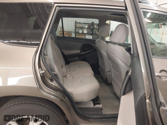 2011 Toyota RAV4 with VIN 2T3BF4DV8BW091196, listed as a IAAI auction lot 41870965 with 214,182 mi miles. Bid and sale history available at carsss.com. Image 8.