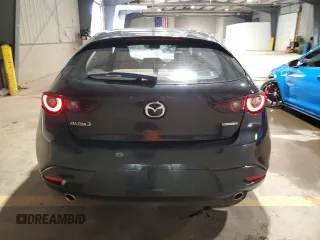 2024 Mazda 3 S Select Sport with VIN JM1BPAKMXR1718852, listed as a Copart auction lot 61240255 with 6,748 mi miles and Salvage title. Bid and sale history available at DreamBid. Image 6.