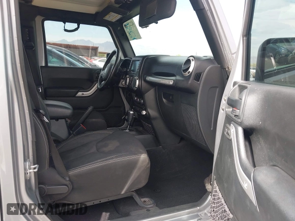 2018 Jeep Wrangler Unlimited Sahara with VIN 1C4BJWEG6JL817231, listed as a IAAI auction lot 42225248 with 68,015 mi miles and . Bid and sale history available at DreamBid. Image 5.
