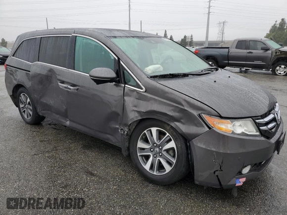 2016 Honda Odyssey Touring Elite with VIN 5FNRL5H97GB090094, listed as a Copart auction lot 50545285 with 158,334 mi miles and Salvage Title. Bid and sale history available at DreamBid. Image 4.