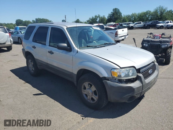 2005 Ford Escape XLS Value with VIN 1FMYU92Z55KC93604, listed as a Copart auction lot 60104145 with 86,788 mi miles and Salvage title. Bid and sale history available at DreamBid. Image 4.