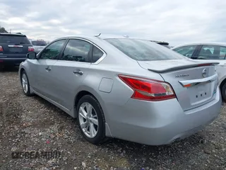 2013 Nissan Altima SV with VIN 1N4AL3AP4DC197077, listed as a IAAI auction lot 41287133 with 165,960 mi miles and . Bid and sale history available at carsss.com. Image 3.