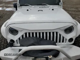2013 Jeep Wrangler Sahara z VIN 1C4AJWBG7DL512437, wystawiony jako Copart lot #48928325 z przebiegiem Nie podano mil oraz Szkoda całkowita • Salvage title. Historia ofert i sprzedaży dostępna na DreamBid. Obrazek 12.