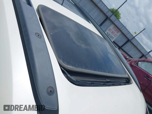2014 Chevrolet Traverse LTZ with VIN 1GNKRJKD2EJ287211, listed as a IAAI auction lot 39873394 with 128,355 mi miles and . Bid and sale history available at DreamBid. Image 14.