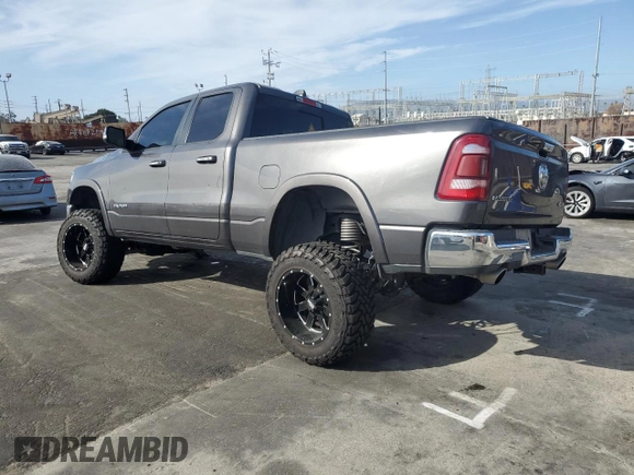 2020 Ram 1500 Laramie with VIN 1C6SRFDT1LN263036, listed as a Copart auction lot 48560655 with 130,923 mi miles and Salvage Title. Bid and sale history available at carsss.com. Image 2.