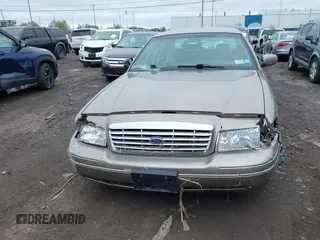 2003 Ford Crown Victoria LX z VIN 2FAFP74W13X120754, wystawiony jako IAAI lot #42212879 z przebiegiem 91 438 mil mil oraz . Historia ofert i sprzedaży dostępna na DreamBid. Obrazek 12.