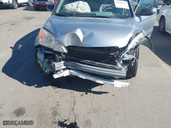 2007 Honda CR-V EX with VIN JHLRE38547C069537, listed as a IAAI auction lot 41685271 with 87,954 mi miles. Bid and sale history available at carsss.com. Image 6.
