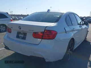 2014 BMW 3 Series 328i xDrive with VIN WBA3B3G51ENR81909, listed as a IAAI auction lot 41990108 with 83,051 mi miles. Bid and sale history available at carsss.com. Image 4.
