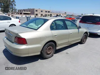2001 Mitsubishi Galant ES z VIN 4A3AA46G61E145767, wystawiony jako IAAI lot #42492873 z przebiegiem 178 351 mil mil oraz . Historia ofert i sprzedaży dostępna na DreamBid. Obrazek 4.