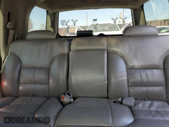 1999 GMC Yukon with VIN 1GKEC13R9XJ704929, listed as a Copart auction lot 89097295 with 87,478 mi miles and Salvage Title. Bid and sale history available at carsss.com. Image 10.