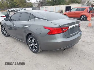 2018 Nissan Maxima S with VIN 1N4AA6AP0JC384660, listed as a IAAI auction lot 41617587 with 121,463 mi miles and . Bid and sale history available at DreamBid. Image 3.