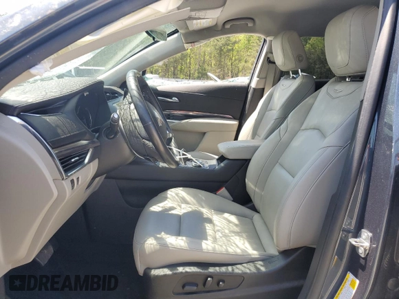 2019 Cadillac XT4 FWD Luxury z VIN 1GYAZAR44KF155215, wystawiony jako Copart lot #52931315 z przebiegiem 78 502 mil mil oraz Szkoda całkowita • Salvage title. Historia ofert i sprzedaży dostępna na DreamBid. Obrazek 7.
