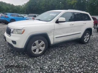 2011 Jeep Grand Cherokee Laredo with VIN 1J4RR4GG2BC641394, listed as a Copart auction lot 63413355 with 218,901 mi miles and Clean title. Bid and sale history available at DreamBid. Image 1.
