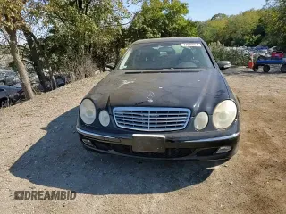 2003 Mercedes-Benz E-Class 3.2L with VIN WDBUF65J03A281430, listed as a Copart auction lot 77086054 with 121,080 mi miles and Salvage Title. Bid and sale history available at carsss.com. Image 11.