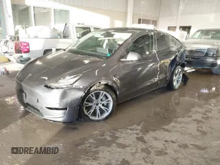 2023 Tesla Model Y Long Range with VIN 7SAYGDEE5PA033341, listed as a IAAI auction lot 41379625 with Not provided miles and . Bid and sale history available at DreamBid. Image 2.