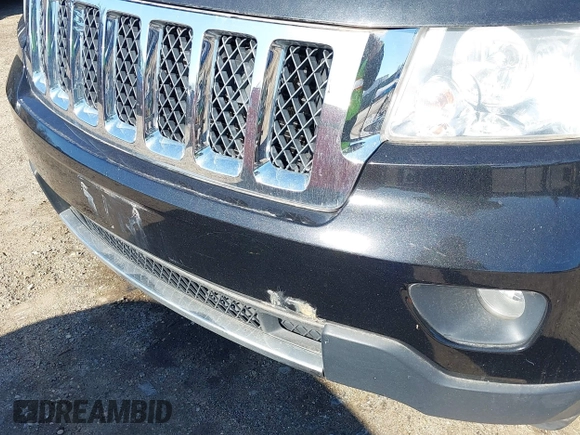 2011 Jeep Grand Cherokee Overland with VIN 1J4RS6GGXBC659349, listed as a IAAI auction lot 41778399 with 219,624 mi miles and . Bid and sale history available at DreamBid. Image 18.